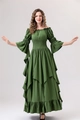 Detail of green Renaissance gown featuring a smocked bodice and layered flare sleeves - Green