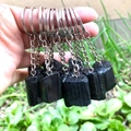 Handheld black tourmaline crystal keychain with silver chain and natural stone texture - Black Tourmaline