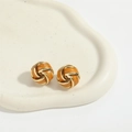 French vintage vortex earrings in gold metal and orange resin with marble texture - Brown
