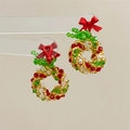 Detailed close-up of beaded Christmas wreath earrings with crystals and a red bow - Christmas Wreath Bow-Ear Clip
