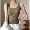 Slim fit olive green knitted cotton tank top for women in a modern minimalist setting - Army Green