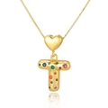 Close-up of gold heart pendant necklace with colorful cubic zirconia letter T charm - Letter T