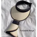 Foldable beige UPF50+ sun hat with wide brim, black strap and decorative G logo - Foldable Design with G Metal Logo / Beige