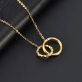 Minimalist interlocking double ring necklace in gold finish on black leather background - Gold (B115)