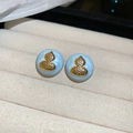 Macro shot of light blue acrylic round stud earrings with golden hulu gourd emblem - Gold-Light Blue-Gourd