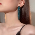 Deep blue rhinestone tassel earrings featuring long drop design on a model - 3D Style / Dark Blue