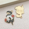 Golden skeleton and black snake alloy pendant charm for DIY jewelry making - Skull Snake