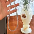 Dettaglio della collana di perle in vetro cristallo trasparente con perline rotonde - Collana di cristallo da 6 mm