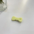 Close-up of a yellow jelly-textured handmade bow hair clip with France Handmade engraving - Pale Yellow - Thickened Bowknot