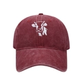 Close-up of cow embroidery on vintage washed cotton baseball cap in deep burgundy - Adjustable / Burgundy