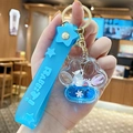 Portachiavi con coniglio blu e orsetto fluttuante in ciondolo a zampa di gatto - Orso Polare Blu sott'Olio - Zampa di Gatto