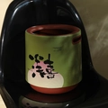 Green luxury high-capacity trash bin with red trim and Xi character on a chair - Gentle Joy (Green Red)