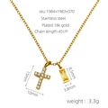 Detailed view of 18K gold plated necklace with zircon cross and yellow gemstone pendants - November/Yellow