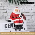 Sitting Santa Claus resin figurine with gift bag, red and white holiday decor 18x16x9cm - Santa With Left Bag