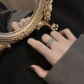 Close-up of double row rhinestone titanium steel ring worn on model hand in luxe setting - US 5 / Silver Double Row