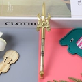 Golden trident shaped novelty pen with intricate engraved patterns and ring handle - Spear Pen - Gold / 0.5mm