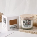 Scented candle in glass jar with wooden lid and artistic tropical label in a gift box - Oud Wood