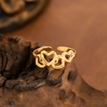 Adjustable golden stainless steel open ring featuring four hollow heart-shaped designs - Adjustable Open / Gold