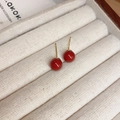 Glossy red round stud earrings with golden pins displayed on a beige jewelry tray - 33# Silver Needle - Red - 10mm (Real Gold Plated)