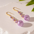 Detail of vintage gold earrings with purple crystals and a lustrous round purple pearl - Purple Ball Ear Hook