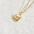 Gold rectangular pendant necklace with engraved starburst motif and white zircon stone - Rectangular Hexagram