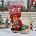Detail of red Christmas stocking with reindeer plush and festive white snowflake appliques - Large Reindeer Christmas Stocking