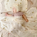 Bamboo cotton muslin swaddle blanket with lemon pattern and matching infant pillow - Milk Tea Lemon