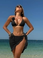 Detail of black bikini set with 3D rose accent and ruffled mini skirt for beachwear - S / Black