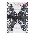 Detail of laser-cut wedding invitation with black glitter cover and satin bow decoration - Black