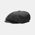 Detailopname van grijze visgraat newsboy pet van wolmix met een korte kleprand - Eén maat / Zwart