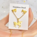 Detail of golden stainless steel unicorn pendant necklace and stud earrings set on card - TT-133 Unicorn 3