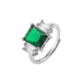 Detail of emerald green square stone ring with side baguette crystals in silver setting - White Gold Emerald Green Square Ring