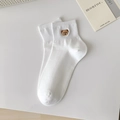 White cotton crew socks featuring cute brown bear embroidery and ribbed cuffs - One Size / White