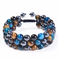 Detailed view of triple-layer braided bracelet with blue and brown tiger eye beads - Yellow Tiger Eye + Obsidian + Blue Tiger Eye Bracelet
