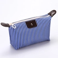 Blue and white striped waterproof cosmetic bag with brown faux leather trim and handle - Blue