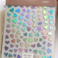 Holographic laser heart nail art stickers featuring colorful 3D bow and peach heart designs - Holographic