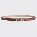Stylish brown leather dress belt for women with a silver metal buckle and stitching details - Camel