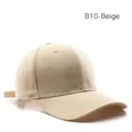 Classic beige cotton baseball cap with adjustable strap and curved brim detail - Beige