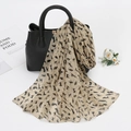 Beige chiffon scarf with black cat prints draped elegantly over a black leather handbag - XQ374 2# Cream Cat