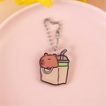 Cute acrylic capybara keychain in a paper bag design with silver bead chain link - Capybara in Paper Bag with Drink