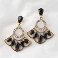 Vintage gold fan earrings with black faceted gems and white rhinestones on white lace - Solid Black