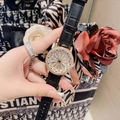 Orologio al quarzo dorato con quadrante a margherita rotante e cinturino in pelle nera - Cinturino Nero Quadrante Rotante