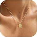 Elegant gold letter Q pendant necklace for women shown on a fashion model's neck - Gold Q