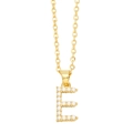 Detail of gold chain necklace with letter E pendant inlaid with small white pearls - Gold Letter E