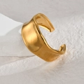 Golden wide wavy open bangle in high-gloss stainless steel on minimalist background - Gold Ripple Wide Band (R742-B)