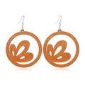 Detailed close-up of brown wooden hoop earrings with intricate hollow leaf patterns - Style 12/Round Hollow Tree Leaf Pattern