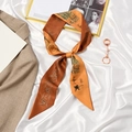 French style silk hair scarf in orange and brown tones with vintage bow pattern - Castle Caramel Orange