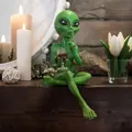 Creative green alien resin figurine sitting with wine glass and shush gesture - Green Alien with Red Wine