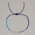 Adjustable woven rice bead bracelet in deep blue nylon with colorful symmetric beads - Dark Blue Rope Turquoise Pink Gold Beads (MI-B230001E)