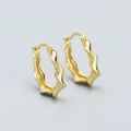 Minimalist gold hoop earrings with irregular wavy texture and elegant metallic finish - 925 Silver / Gold